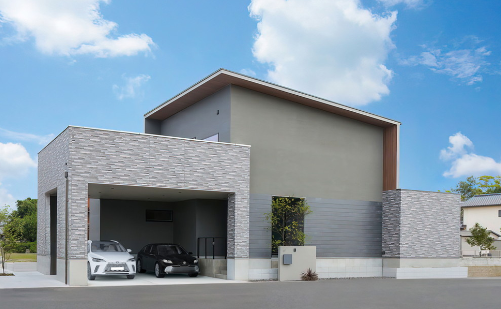 グレーで統一された開放感あるインナーガレージ住宅